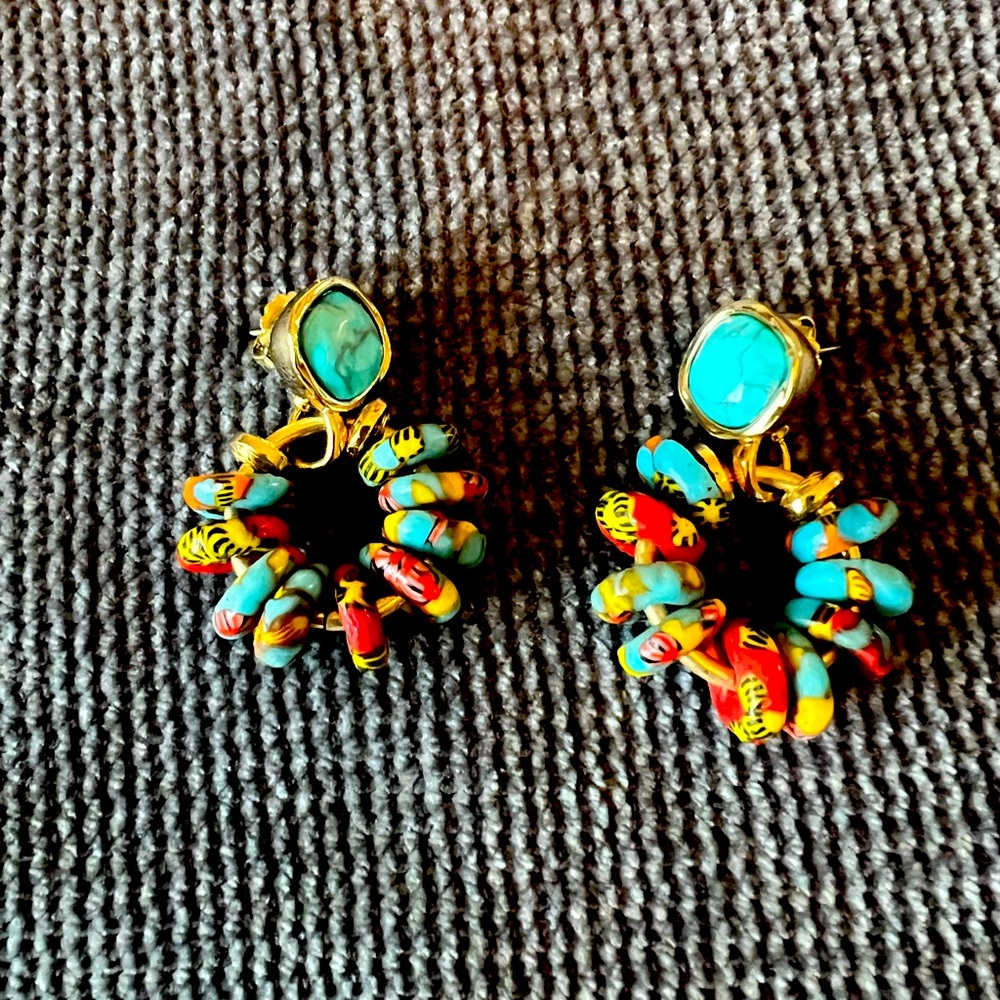Like new, multi colored stones in a gold loop. For pierced ears.